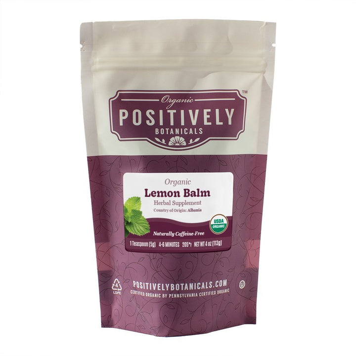 Positively Botanicals Organic Lemon Balm herbal tea, 4 oz resealable bag, naturally caffeine-free with relaxing flavor notes.