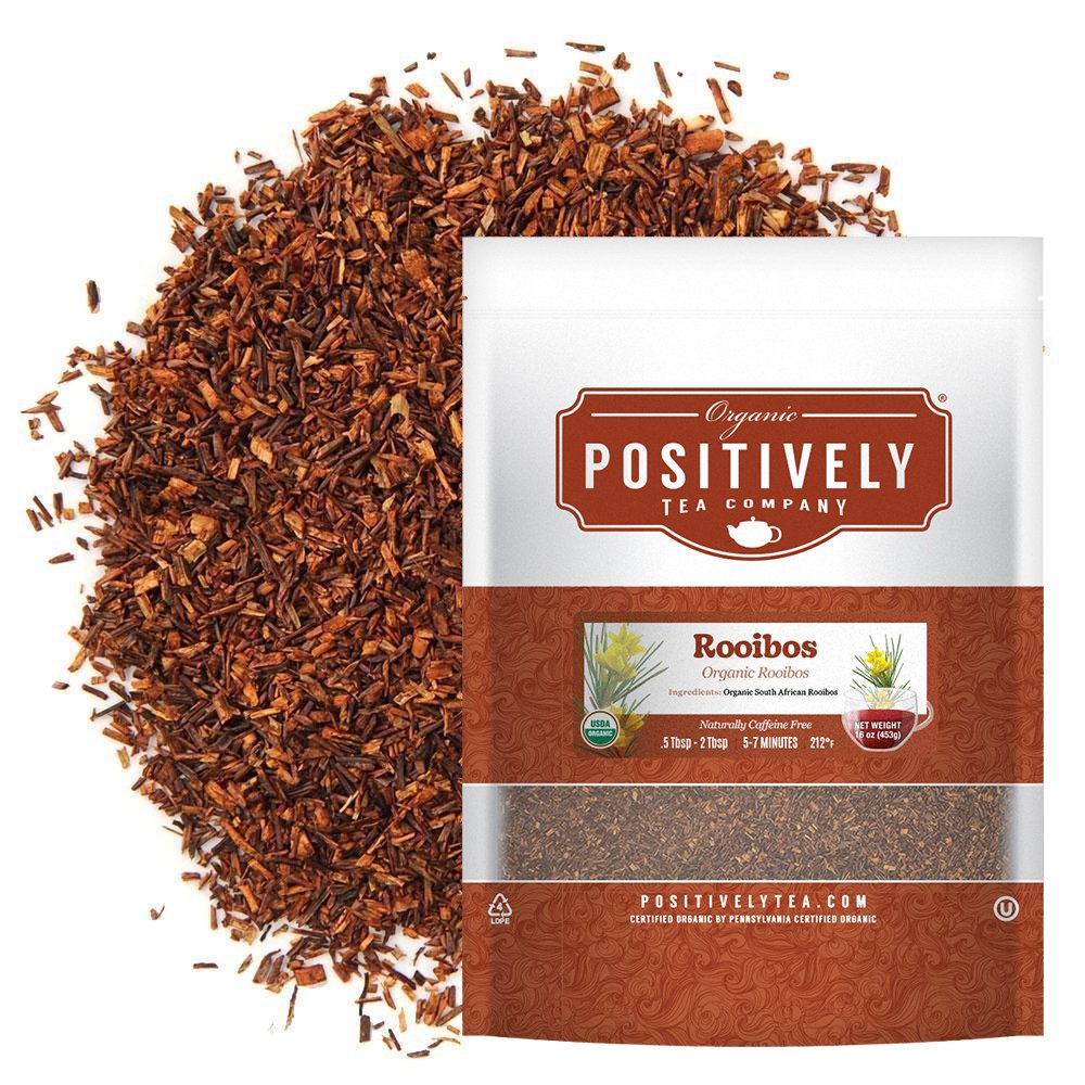 Positively Tea Company Organic Rooibos tea, 16oz bag, displayed with loose leaf tea highlighting its smooth, naturally caffeine-free flavor.