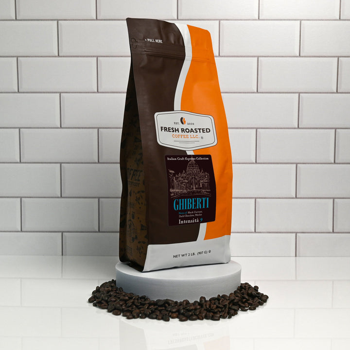 Fresh Roasted Coffee Ghiberti espresso blend, 2 lb bag displayed with whole beans, featuring a robust Intensity 9 roast with tasting notes of merlot, dark chocolate, and black currant.