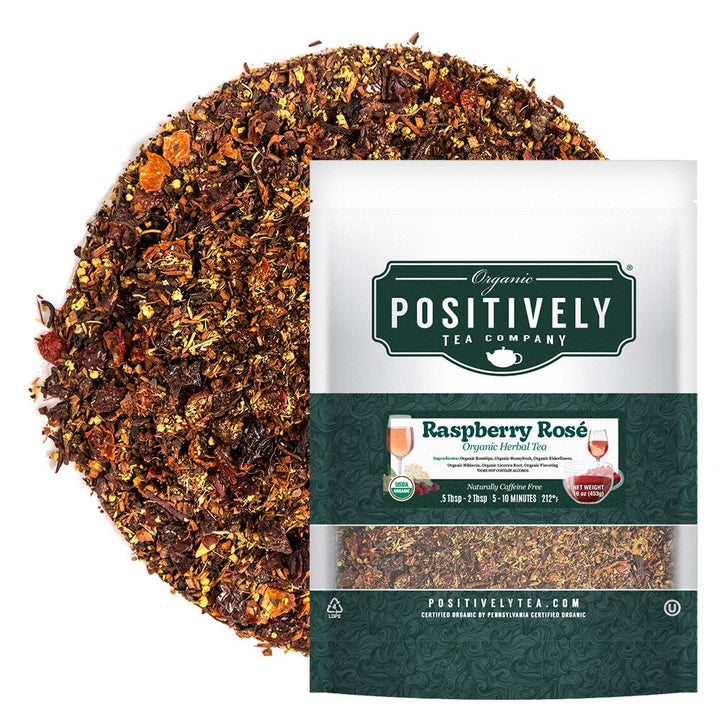 Positively Tea Company Raspberry Rosé organic herbal tea, loose leaf blend displayed alongside resealable 2 oz bag.